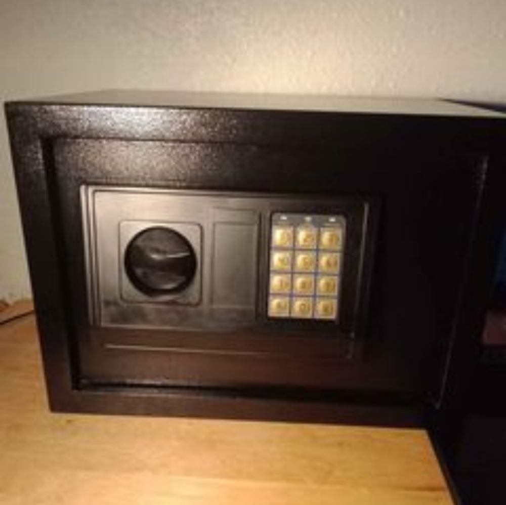 Safe lock box with key and changeable codes black key 14 ok inches wide by 10 in